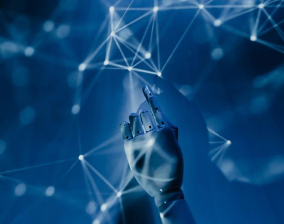 Futuristic robotic hand pointing at a network of glowing connections, symbolizing the future of business communication through AI and innovation.