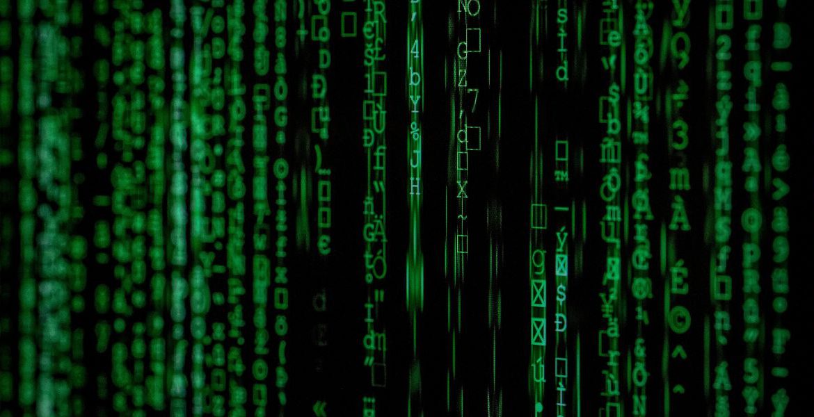 Encrypted digital symbols on a screen representing VoIP encryption for secure business communication