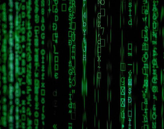 Encrypted digital symbols on a screen representing VoIP encryption for secure business communication