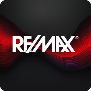 The Re/Max logo in white, stylized serif font, against a dark background with a red gradient banner across the center. The 'Re', and 'Max' words are separated by a slash, and a registered trademark symbol appears at the upper right of the 'X'.